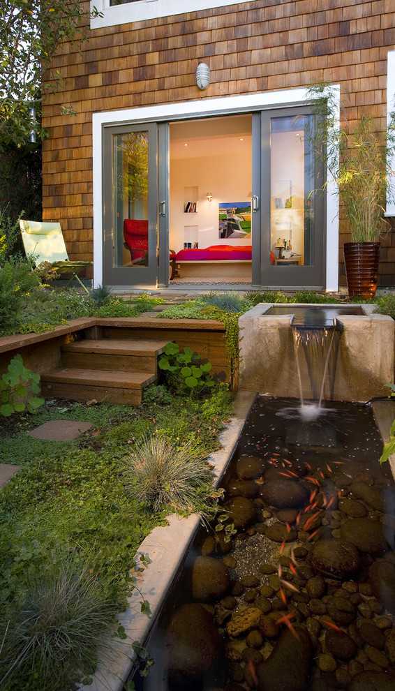 8 Beautiful Backyards to Drool Over - Koi Pond and Waterfall