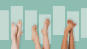 Multiple pairs of bare feet arranged against a green background, symbolizing small steps toward sustainability.